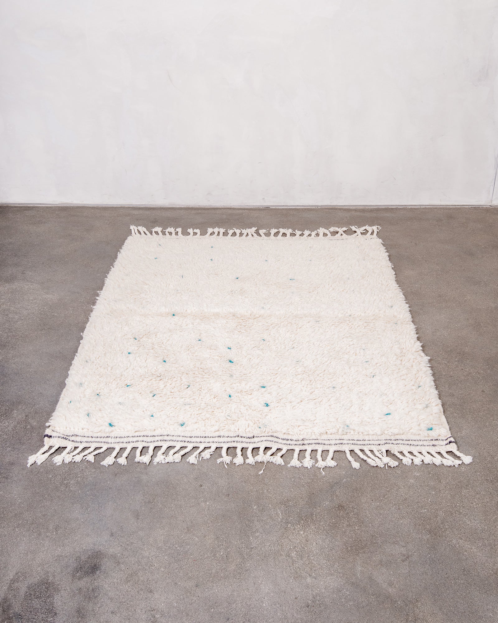 Modern, designer, handcrafted Berber rug from Morocco. Beniourain carpet with beautiful colours and patterns and fluffy wool texture.